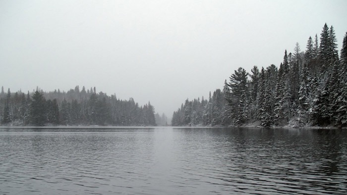 Paddling Rain Lake amid more snowfall